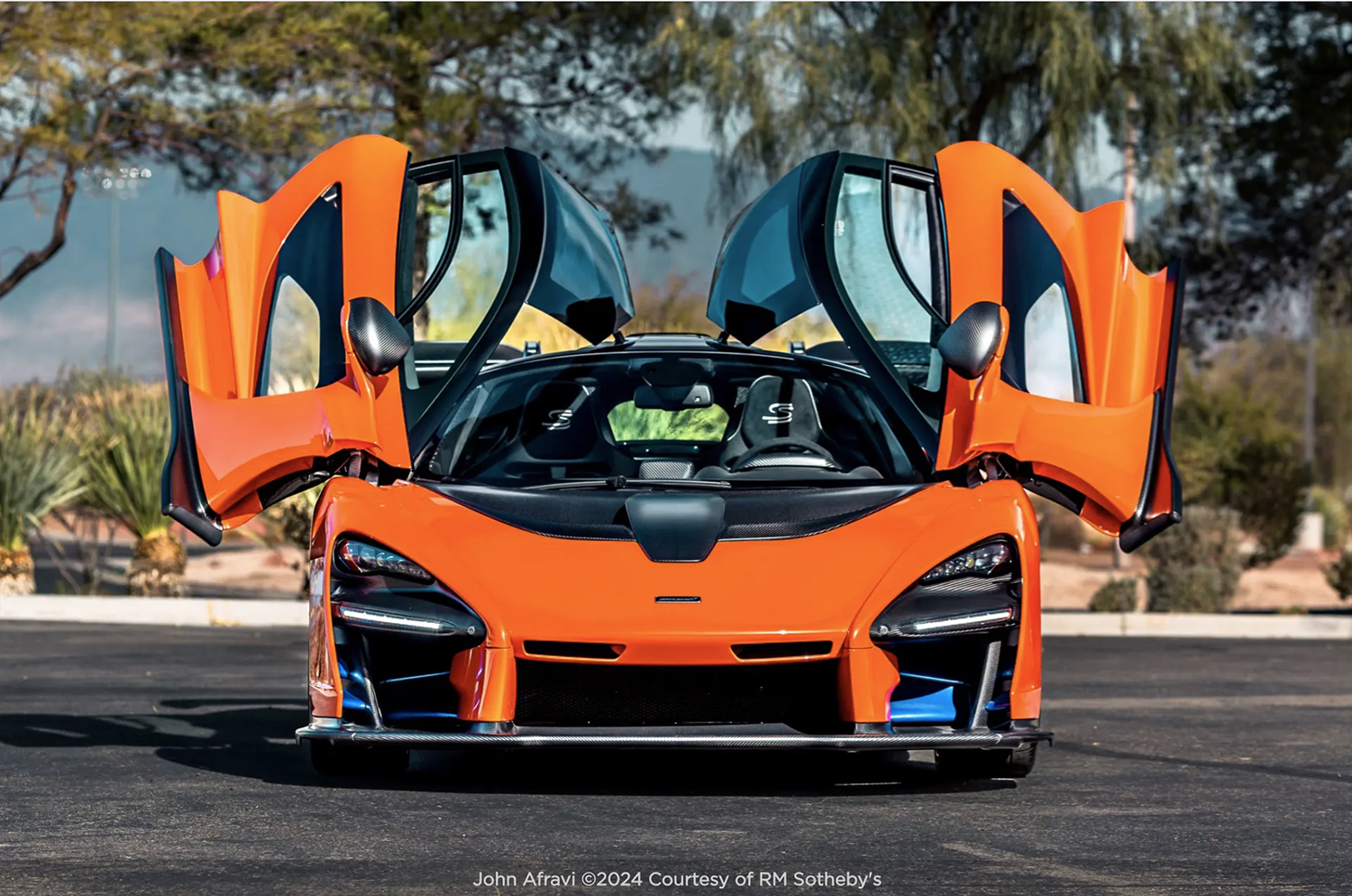 Orange McLaren front view, doors open